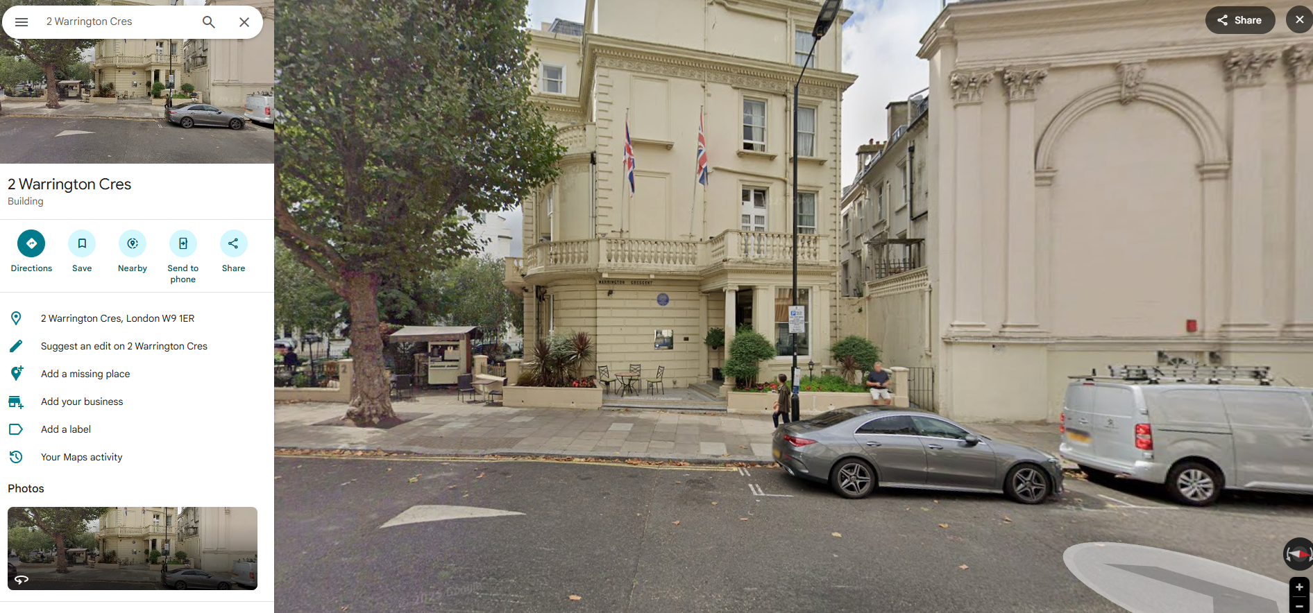 Street View of 2 Warrington Crescent in Maida Vale showing the cream-coloured building with two Union Jack flags and Alan Turing’s blue plaque on the façade.
